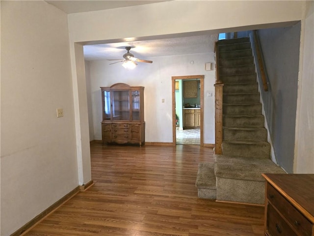 1505 Berkshire Ave, Brookline, PA 15226 - living room with ceiling fan, wood finished floors, stairs, and baseboards