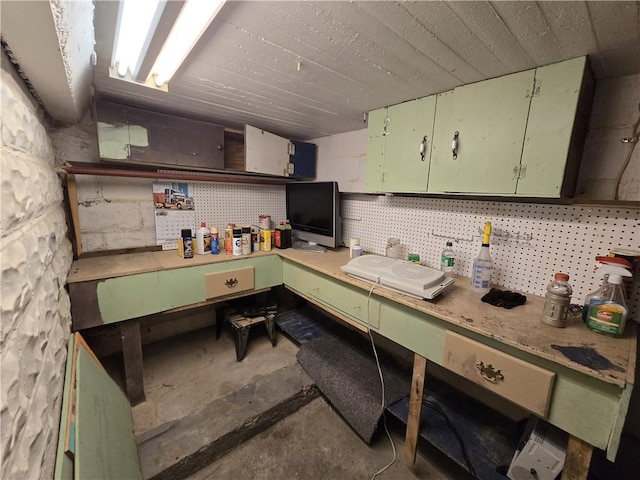1505 Berkshire Ave, Brookline, PA 15226 - kitchen with unfinished concrete flooring, green cabinets, and light countertops