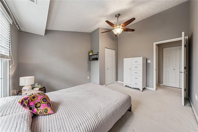 8201 Club Side Dr, Adams Twp, PA 16046 - bedroom featuring lofted ceiling, a textured ceiling, light carpet, baseboards, and a ceiling fan
