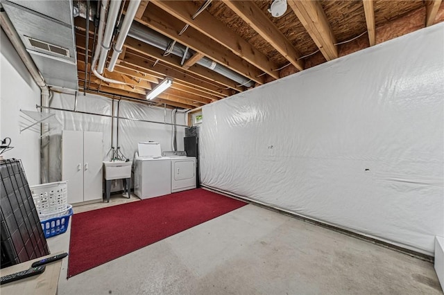 8201 Club Side Dr, Adams Twp, PA 16046 - unfinished basement featuring washer and dryer and a sink