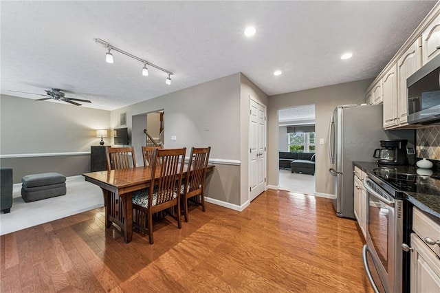 8201 Club Side Dr, Adams Twp, PA 16046 - dining room featuring light wood-style flooring, ceiling fan, recessed lighting, baseboards, and a textured ceiling
