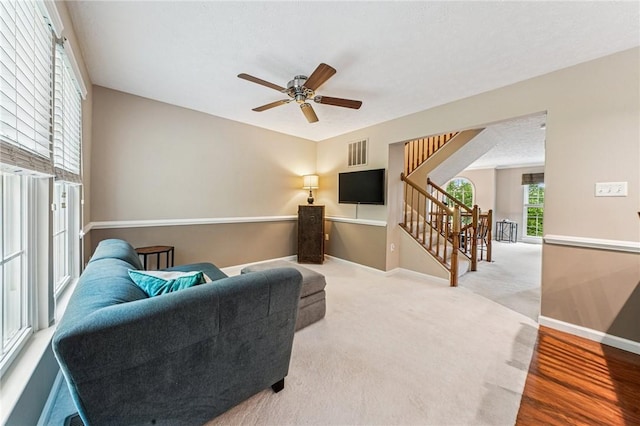 8201 Club Side Dr, Adams Twp, PA 16046 - living room with ceiling fan, stairway, and baseboards