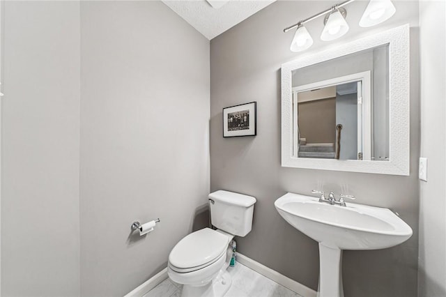 8201 Club Side Dr, Adams Twp, PA 16046 - bathroom with toilet, baseboards, and marble finish floors