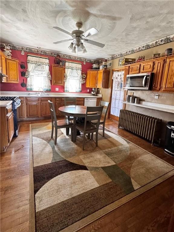 211 Stephens St, Vanderbilt, PA 15486 - dining space with a ceiling fan, light wood-style floors, and a textured ceiling