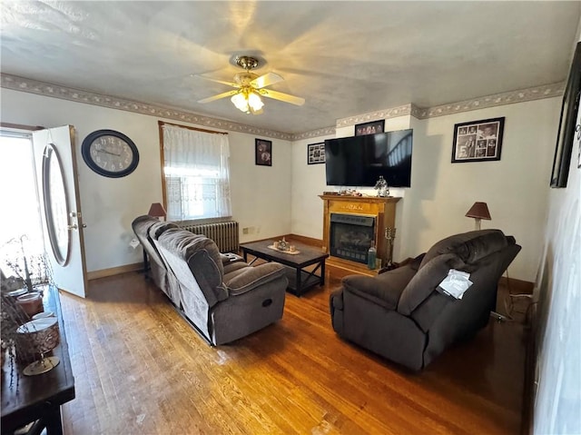 211 Stephens St, Vanderbilt, PA 15486 - living area with a ceiling fan, wood finished floors, a fireplace, and baseboards