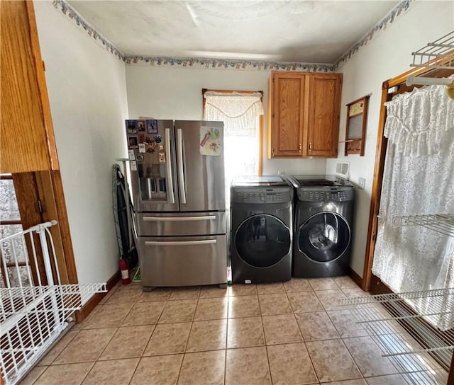 211 Stephens St, Vanderbilt, PA 15486 - washroom with washer and dryer, light tile patterned flooring, cabinet space, and baseboards