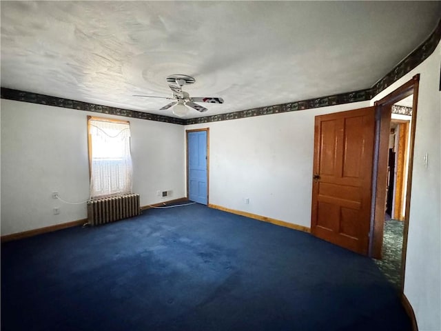 211 Stephens St, Vanderbilt, PA 15486 - carpeted spare room featuring radiator, a ceiling fan, and baseboards