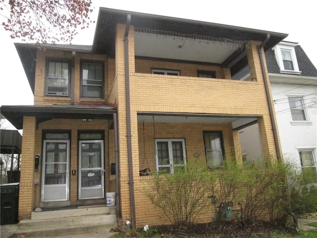 386 Woodland Ave, Oakmont, PA 15139 - view of front facade with brick siding and entry steps