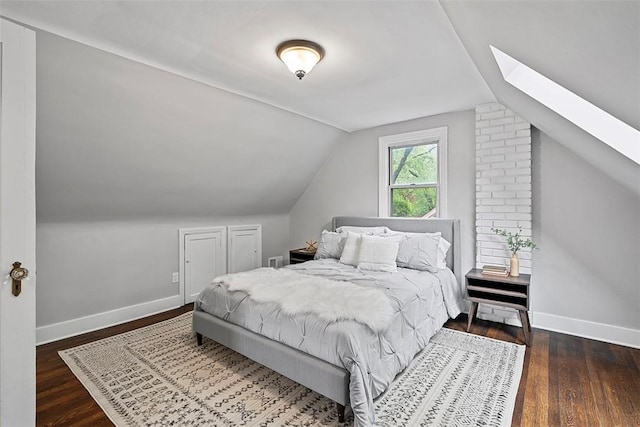 273 Inglewood Dr, Mt Lebanon, PA 15228 - bedroom featuring lofted ceiling, a skylight, wood finished floors, and baseboards