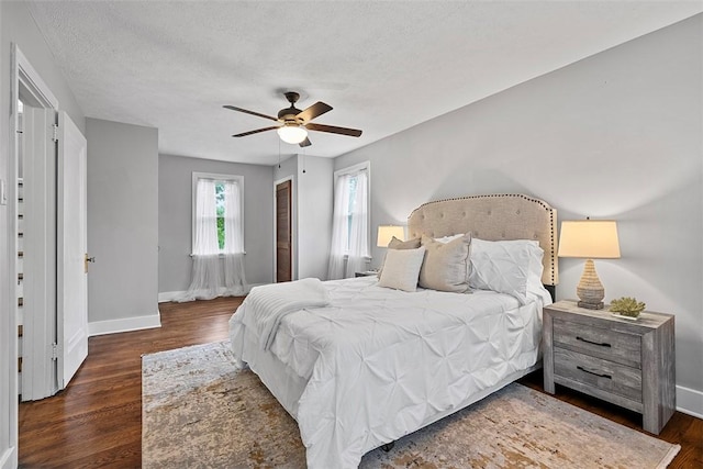 273 Inglewood Dr, Mt Lebanon, PA 15228 - bedroom featuring baseboards, wood finished floors, a ceiling fan, a textured ceiling, and a closet