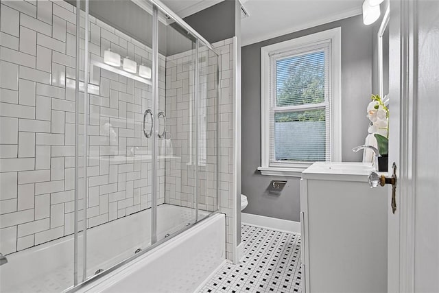 273 Inglewood Dr, Mt Lebanon, PA 15228 - bathroom featuring toilet, vanity, combined bath / shower with glass door, baseboards, and ornamental molding