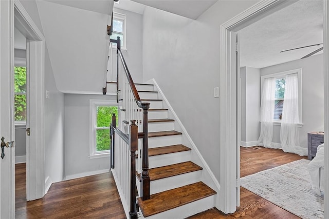 273 Inglewood Dr, Mt Lebanon, PA 15228 - stairway featuring wood finished floors, healthy amount of natural light, and baseboards