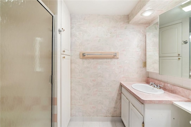 5600 Munhall Rd Unit 606, Squirrel Hill, PA 15217 - full bath featuring wallpapered walls, vanity, a stall shower, and baseboards