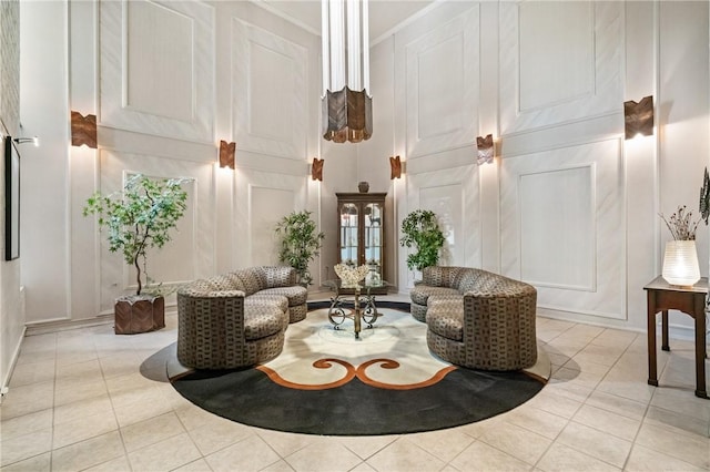 5600 Munhall Rd Unit 606, Squirrel Hill, PA 15217 - community lobby featuring a decorative wall, a towering ceiling, and crown molding