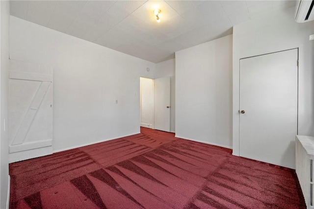 636 Edmond St, Bloomfield, PA 15224 - unfurnished bedroom with a wall mounted AC, carpet flooring, radiator, and baseboards
