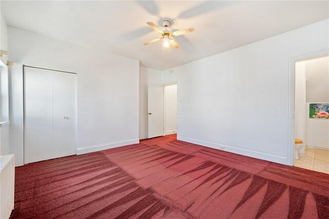 636 Edmond St, Bloomfield, PA 15224 - unfurnished bedroom with carpet, radiator, a closet, and baseboards