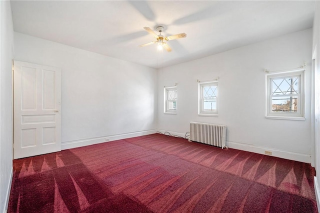 636 Edmond St, Bloomfield, PA 15224 - spare room featuring radiator, carpet, a ceiling fan, and baseboards