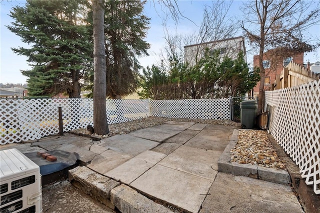 636 Edmond St, Bloomfield, PA 15224 - fenced backyard featuring a patio