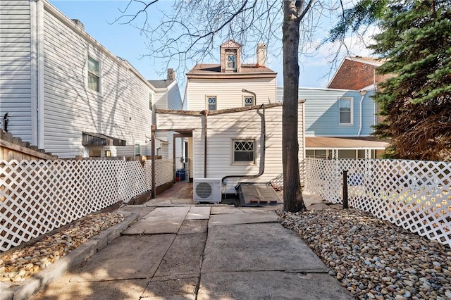 636 Edmond St, Bloomfield, PA 15224 - back of property featuring a patio area and a cooling unit