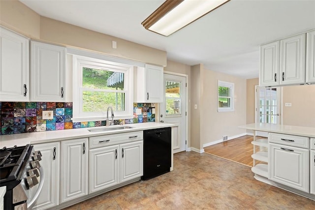 108 W Rd, Shaler, PA 15209 - kitchen with dishwasher, a sink, gas stove, and white cabinets