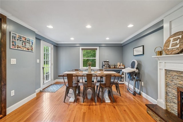 1507 Woodlawn Dr, Unity Twp, PA 15650 - dining area with light wood-type flooring, ornamental molding, a fireplace, baseboards, and recessed lighting