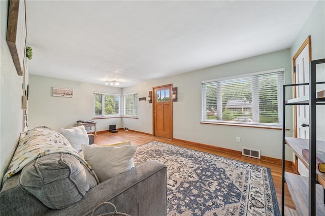 1507 Woodlawn Dr, Unity Twp, PA 15650 - living room featuring wood finished floors and baseboards