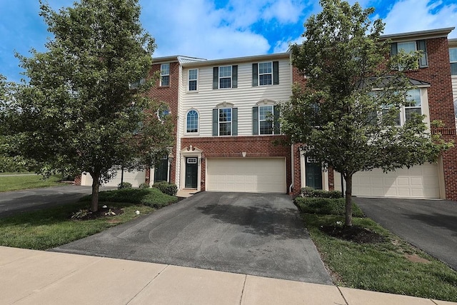 2014 Black Bear Way, Bridgeville, PA 15017 - multi unit property featuring brick siding, driveway, and a garage