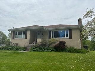 798 Hecla Rd, Mount Pleasant Twp Wml, PA 15666 - view of front of home featuring a chimney and a front yard