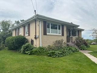 798 Hecla Rd, Mount Pleasant Twp Wml, PA 15666 - view of property exterior with a lawn and brick siding
