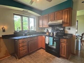 798 Hecla Rd, Mount Pleasant Twp Wml, PA 15666 - kitchen with under cabinet range hood, black / electric stove, a sink, dark countertops, and ceiling fan