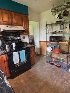 798 Hecla Rd, Mount Pleasant Twp Wml, PA 15666 - kitchen with under cabinet range hood, black / electric stove, brown cabinets, and dark countertops