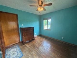 798 Hecla Rd, Mount Pleasant Twp Wml, PA 15666 - unfurnished bedroom with wood finished floors, baseboards, and a ceiling fan