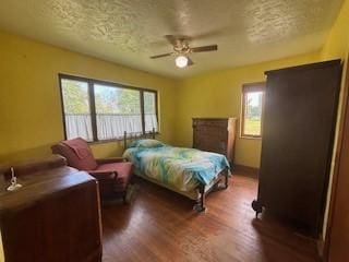 798 Hecla Rd, Mount Pleasant Twp Wml, PA 15666 - bedroom featuring a textured ceiling, wood finished floors, and ceiling fan