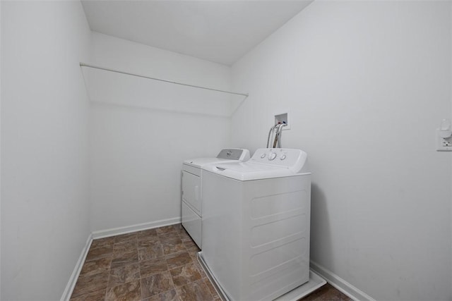 1033 Granite Dr, South Fayette, PA 15057 - washroom with washing machine and dryer, stone finish flooring, and baseboards