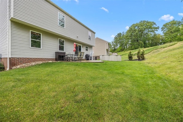 1033 Granite Dr, South Fayette, PA 15057 - back of property with a lawn and a patio