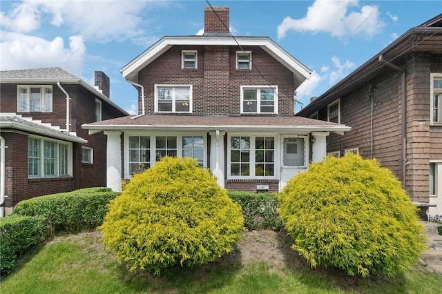 7333 Mcclure Ave, Swissvale, PA 15218 - view of front of house with brick siding and a chimney