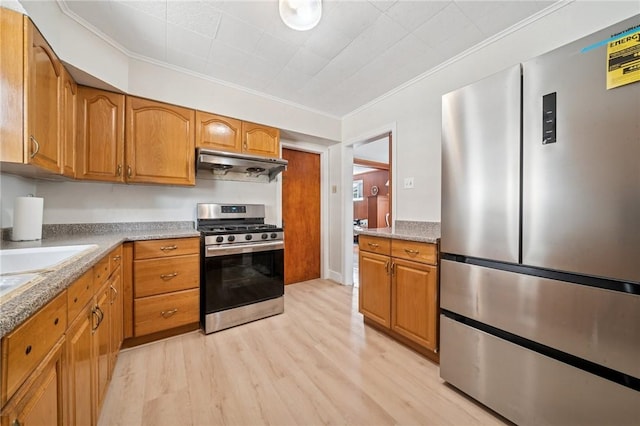 7333 Mcclure Ave, Swissvale, PA 15218 - kitchen with appliances with stainless steel finishes, under cabinet range hood, crown molding, light wood-style flooring, and brown cabinetry