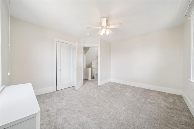 7333 Mcclure Ave, Swissvale, PA 15218 - spare room with a ceiling fan, carpet floors, and baseboards