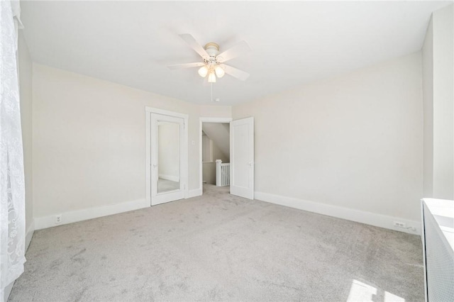 7333 Mcclure Ave, Swissvale, PA 15218 - unfurnished bedroom featuring carpet, baseboards, and a ceiling fan
