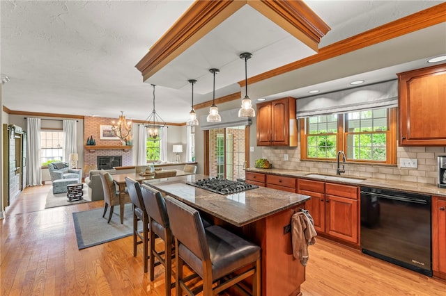 105 Pin Oak Ct, Peters Twp, PA 15367 - kitchen with dishwasher, a sink, stainless steel gas stovetop, healthy amount of natural light, and ornamental molding