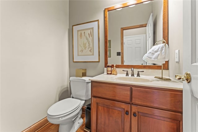 105 Pin Oak Ct, Peters Twp, PA 15367 - bathroom featuring vanity, toilet, and wood finished floors