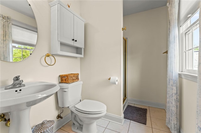 105 Pin Oak Ct, Peters Twp, PA 15367 - bathroom featuring toilet, a stall shower, tile patterned floors, and baseboards