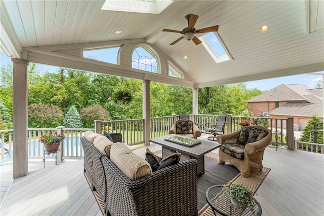 105 Pin Oak Ct, Peters Twp, PA 15367 - wooden deck with an outdoor living space with a fire pit and a ceiling fan
