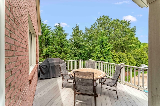 105 Pin Oak Ct, Peters Twp, PA 15367 - wooden deck with outdoor dining area and area for grilling