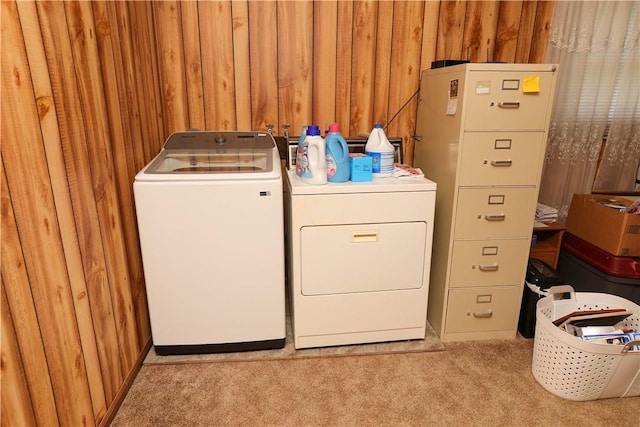 23 Main St, W Pike Run Twp, PA 15427 - laundry area featuring washing machine and clothes dryer, carpet flooring, and wood walls