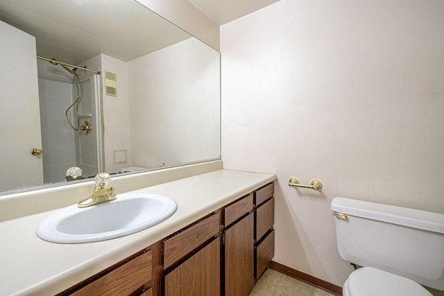 333 S Highland Ave Unit 303, Shadyside, PA 15206 - bathroom featuring toilet, vanity, and a shower