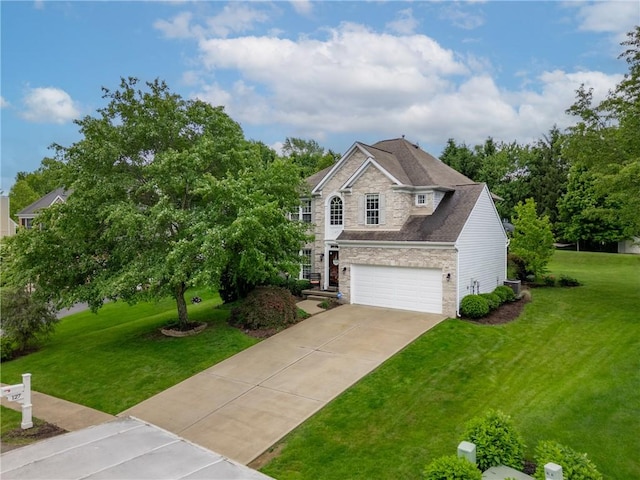 127 Aberdeen Dr, Cranberry Twp, PA 16066 - traditional home featuring stone siding, a front yard, driveway, an attached garage, and central air condition unit