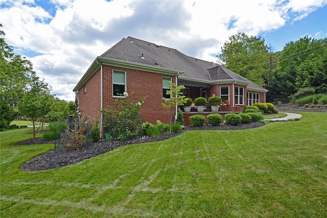 3875 Ashland Ct, Hampton, PA 15101 - back of house featuring brick siding and a lawn