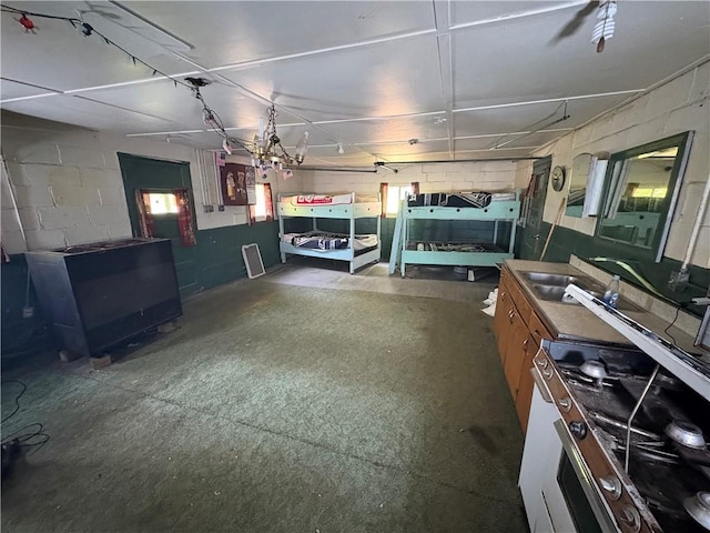 23682 Rte 949, Ridgway, PA 15853 - garage with a workshop area, concrete block wall, and a sink