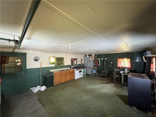 23682 Rte 949, Ridgway, PA 15853 - interior space featuring a sink, concrete block wall, and concrete flooring